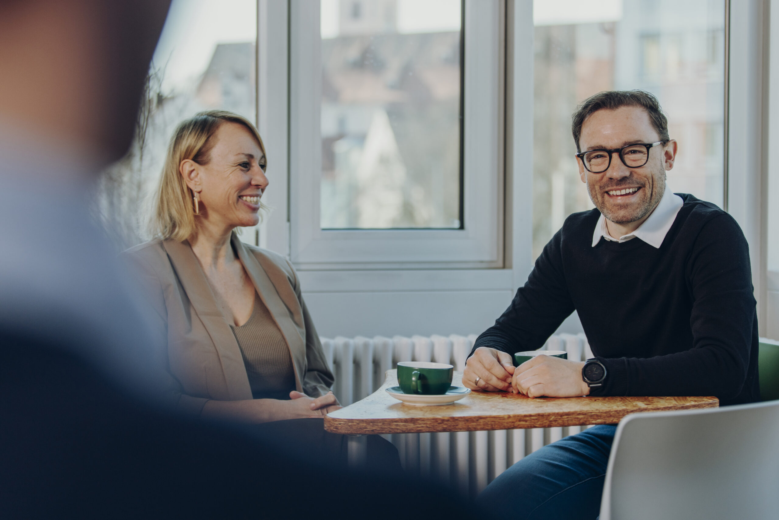 Mitarbeiter beim Kaffee trinken